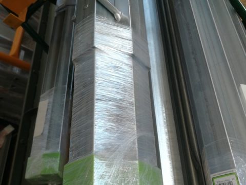 Extendable screed rail with spring and support foot